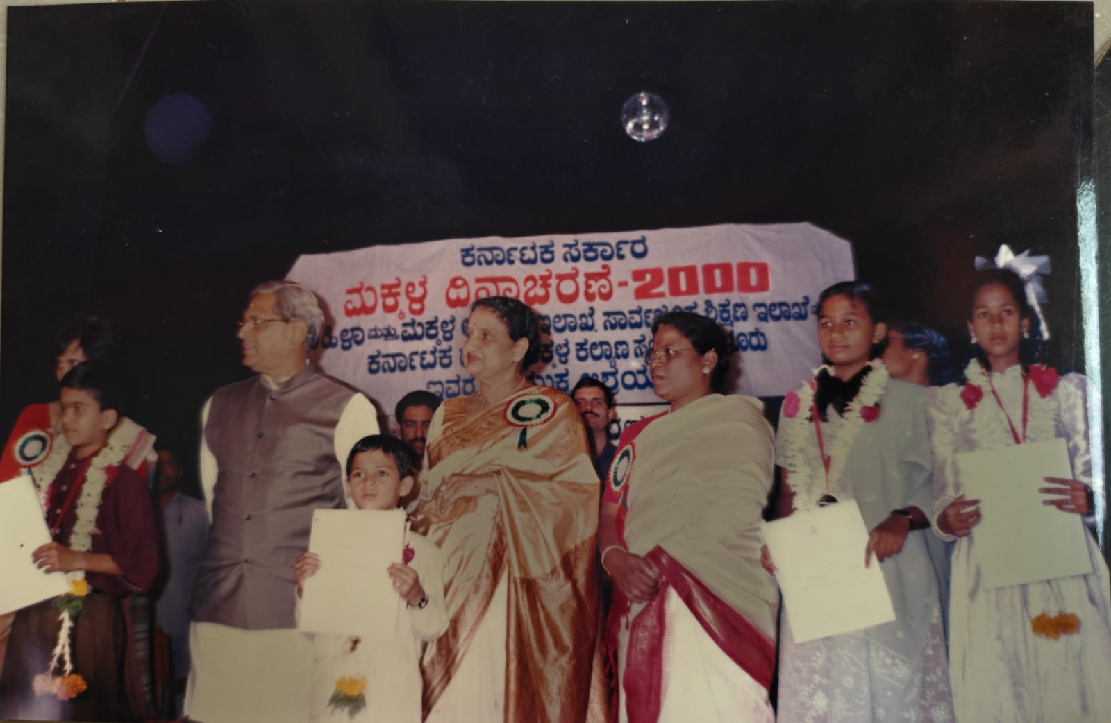 Kavyashree N G receiving her award certificate, 2000
