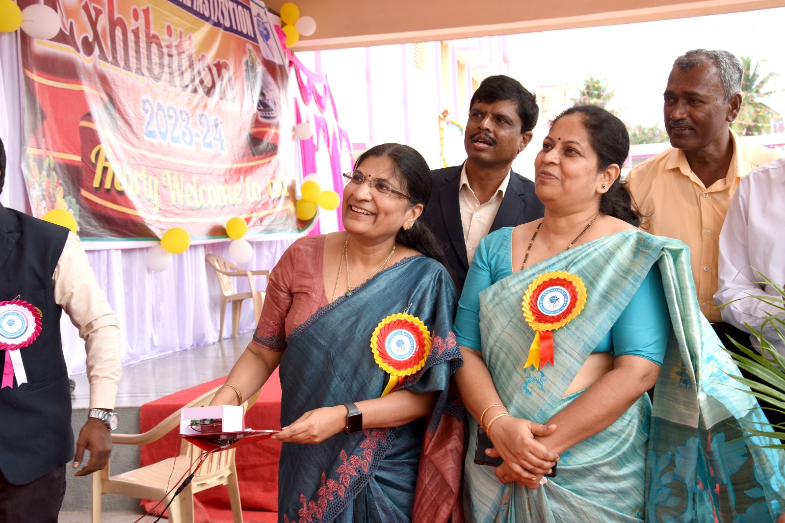 Switching on a working model at the Exhibition 2023-24
