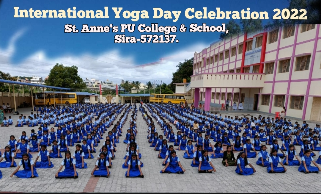 Students performing mass yoga on International Yoga Day 2022